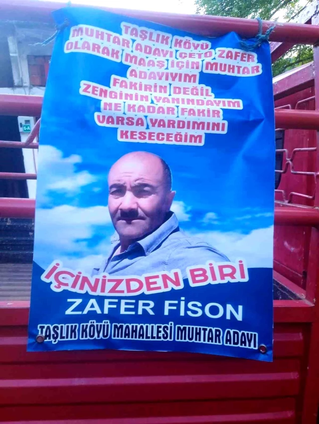 Astığı afişle gündem olan muhtar adayına para cezası